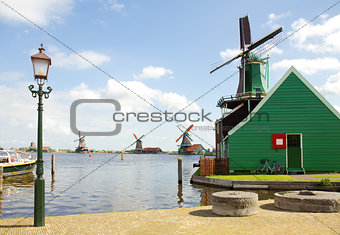 dutch windmills over river in Zaanse Schans