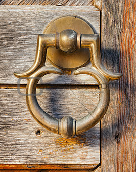 old brass door handle