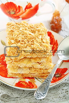 Cake of puff pastry with cream.