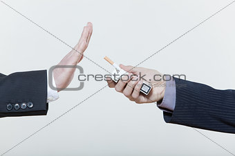 two men  hands stop smoking gesture