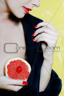 Beautiful Woman Portrait Showing grapefruit breast