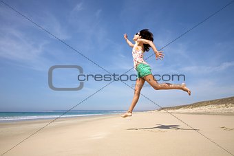 big jump on sandy beach