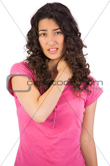 Young brunette with painful neck