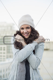 Pretty young brunette shivering