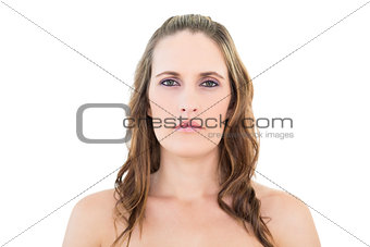 Portrait of woman looking seriously at camera