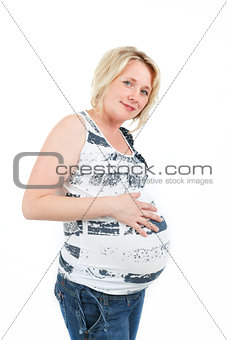 beautiful pregnant woman tenderly holding her tummy isolated on white background