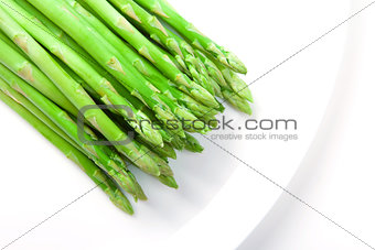 Asparagus on white plate