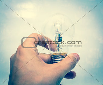 Lightbulb in hand