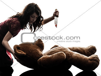 strange young woman killing her teddy bear silhouette