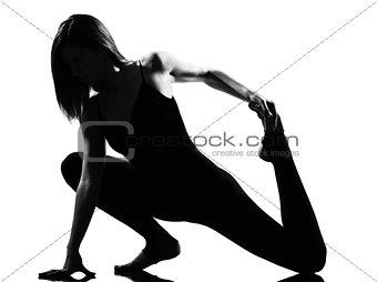 one woman fitness workout dancer stretching legs warming up