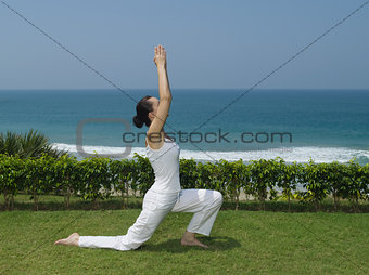 woman yoga seaside