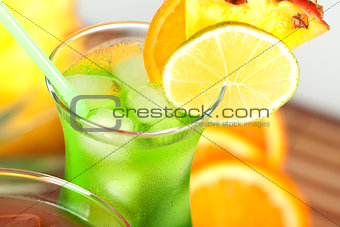Green tropical cocktail with pineapple