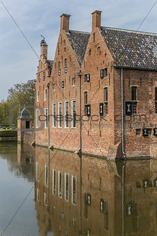 Old dutch mansion with reflection in the water