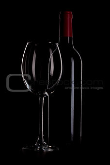Wine bottle and glass outline on black