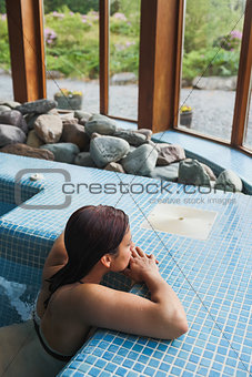 Brunette relaxing in a jacuzzi
