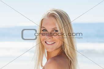Close up view of blond woman smiling at camera