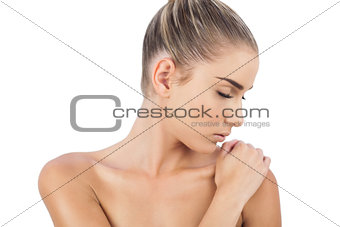 Close up of a cute woman closing her eyes