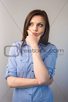 Pensive serious brunette posing