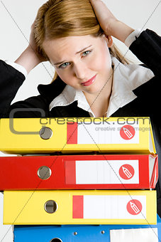 portrait of businesswoman with folders
