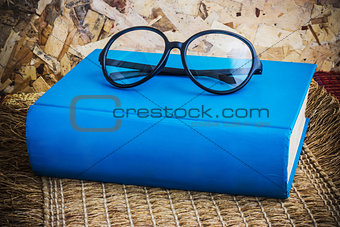 Book and glasses