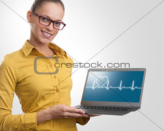 beautiful woman showing a laptop. Health care concept