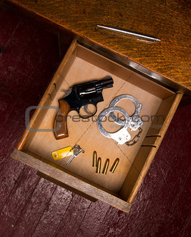 Desk Drawer Full of Self Defense Items and Gun