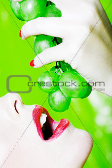 Woman Portrait eat grape