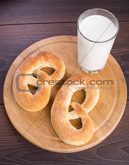 Homemade warm soft pretzels and glass of milk