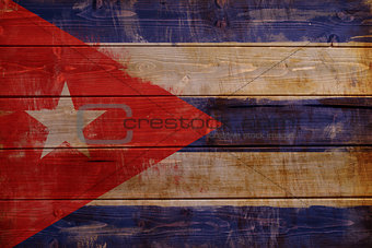 Cuba flag painted on wood aces