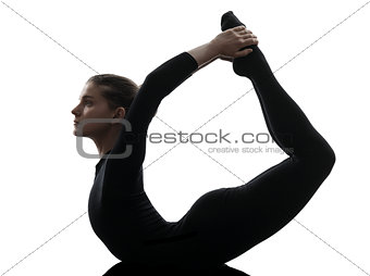 woman exercising gymnastic yoga urdhva dhanurasana upward bow po