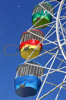 Vivid Ferris Wheel and Moon