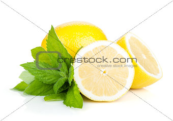 Three ripe lemons and mint