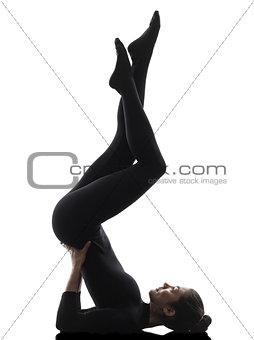 woman exercising gymnastic salamba sarvangasana Shoulder Stand y