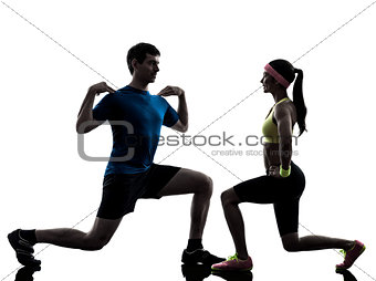 woman exercising fitness workout with man coach