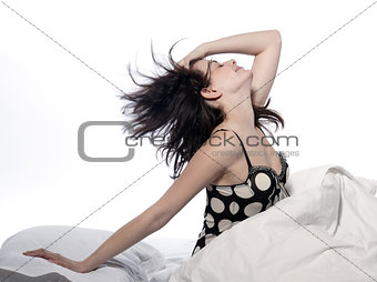 woman in bed awakening