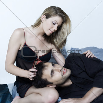 young couple in a bed