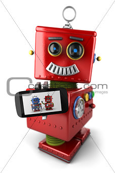 Vintage toy robot with smartphone