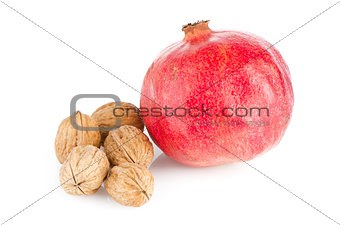Ripe pomegranate fruit and nuts