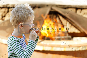 boy eating smores