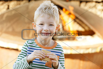 boy eating smores