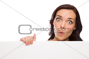 Wide Eyed Mixed Race Female Holding Blank Sign on White 