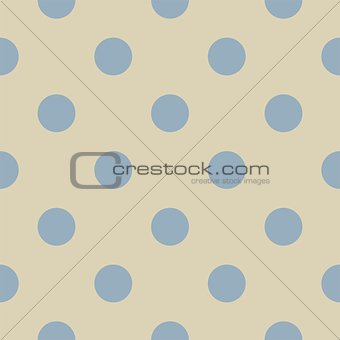 Retro seamless pattern or texture with big pastel blue polka dots on light beige, neutral background