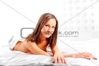 Sexy girl lying on the bed.