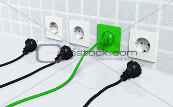 Ecological green plug into a green socket