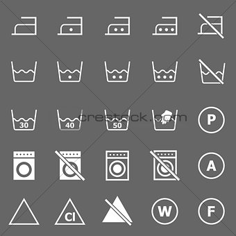 Laundry icons on gray background