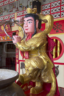 Chinese figure at shrine