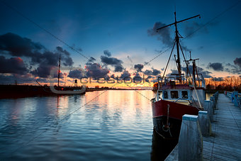 fishing ships at sunset in Zoutkamp