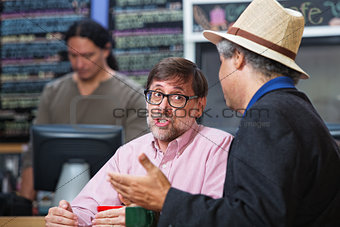 Pair of Men in Cafe