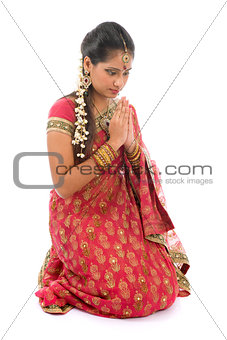 Indian girl in a praying position