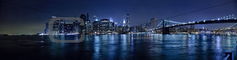 The New York City skyline w Brooklyn Bridge Hi-Res